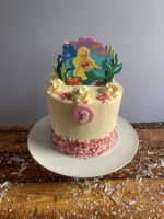 Tall Tier Mermaid Themed Birthday Cake with Pink Sprinkles